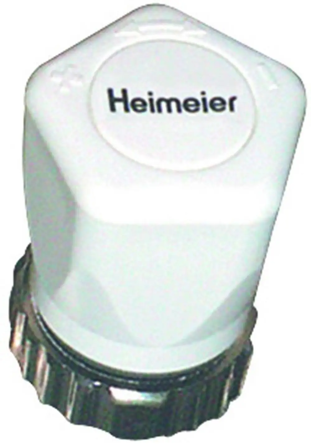 Weiße Handregulierkappe mit hexagonalem Design, befestigt an einem Thermostatventil, hergestellt von IMI Hydronic Engineering.